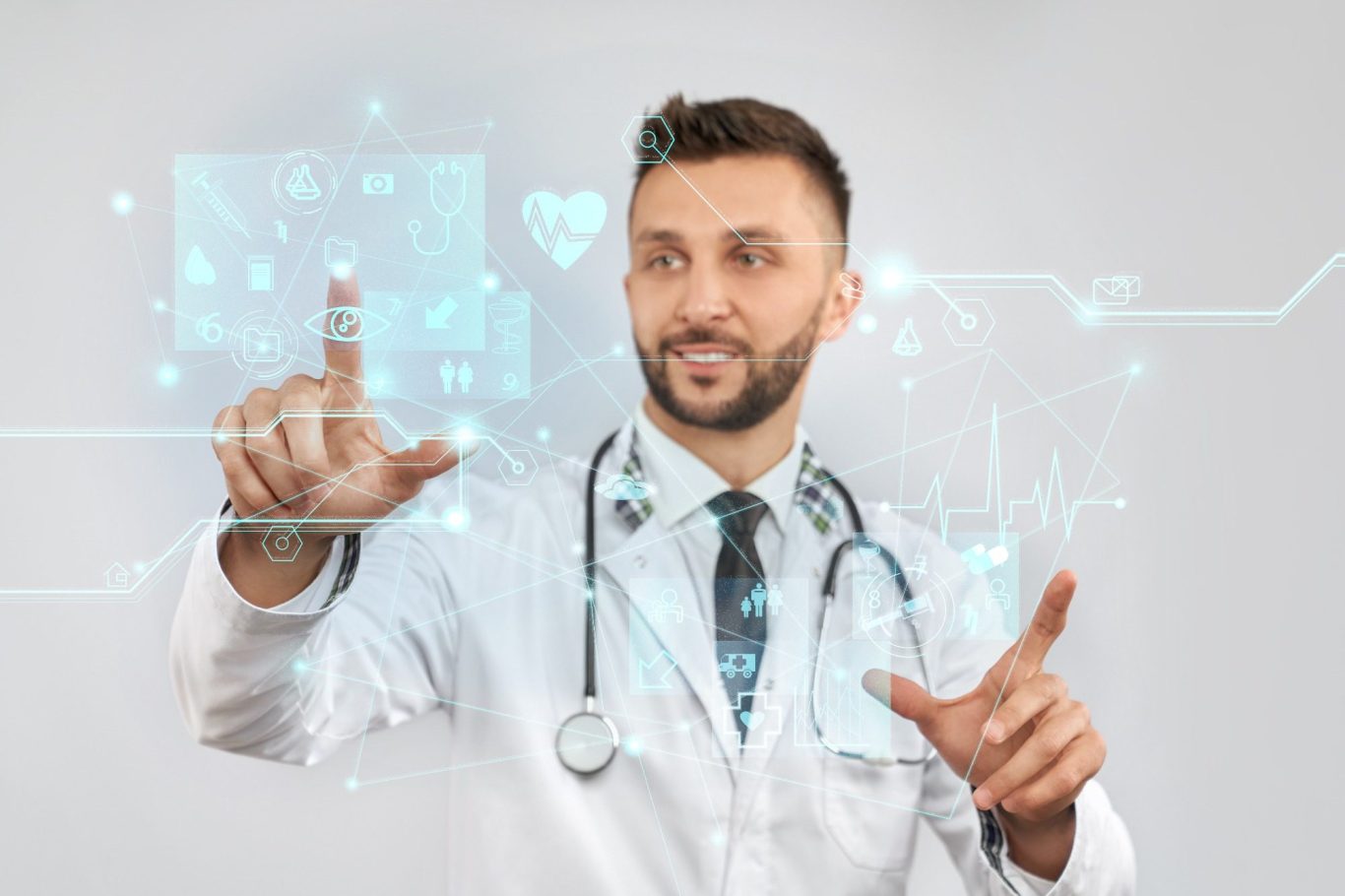 Male doctor in a white coat interacting with digital health data and graphs.